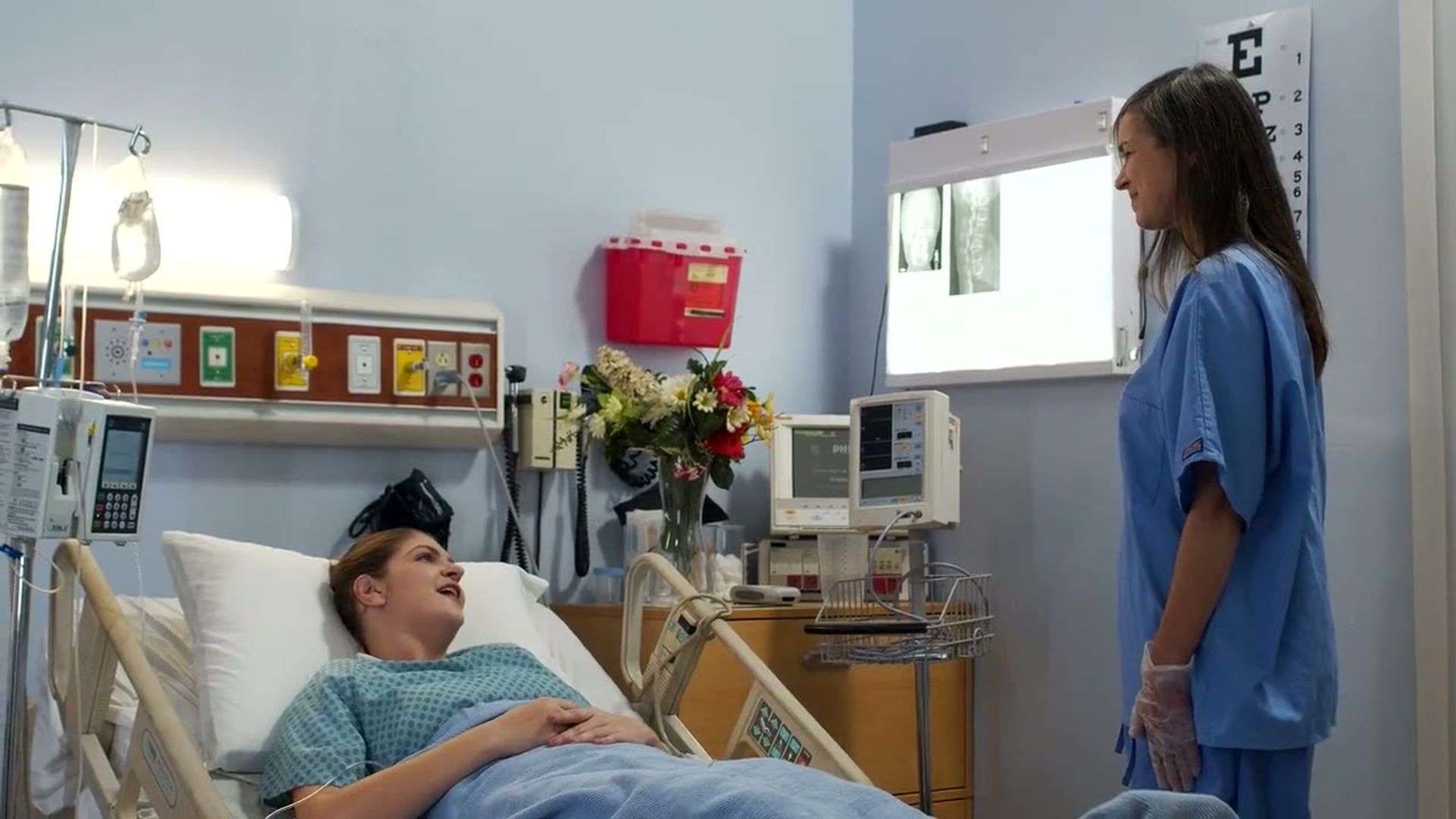 Nursing assistant students practicing a bedside skill on a manikin during class