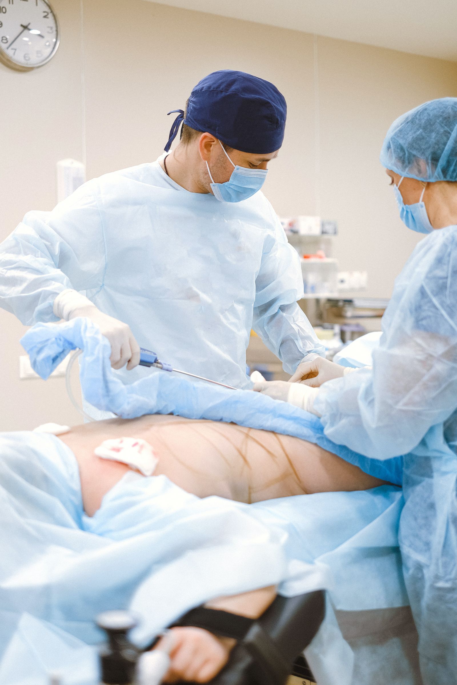 Surgical team practising a procedure in a sterile operating room