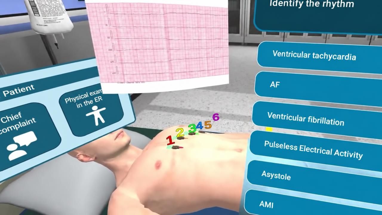 The ECG simulator asking a student to identify the rhythm, with the printed strip above the patient