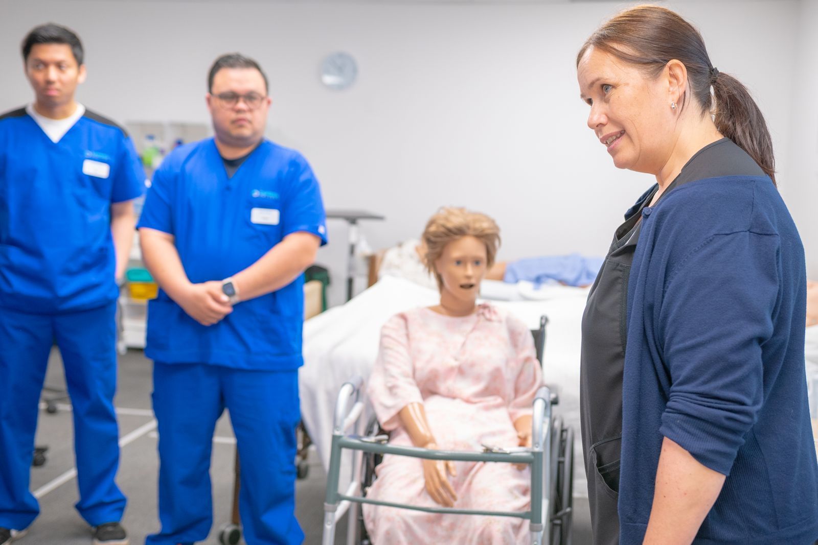 A clinician in a consultation, the kind of conversation virtual patient simulation rehearses