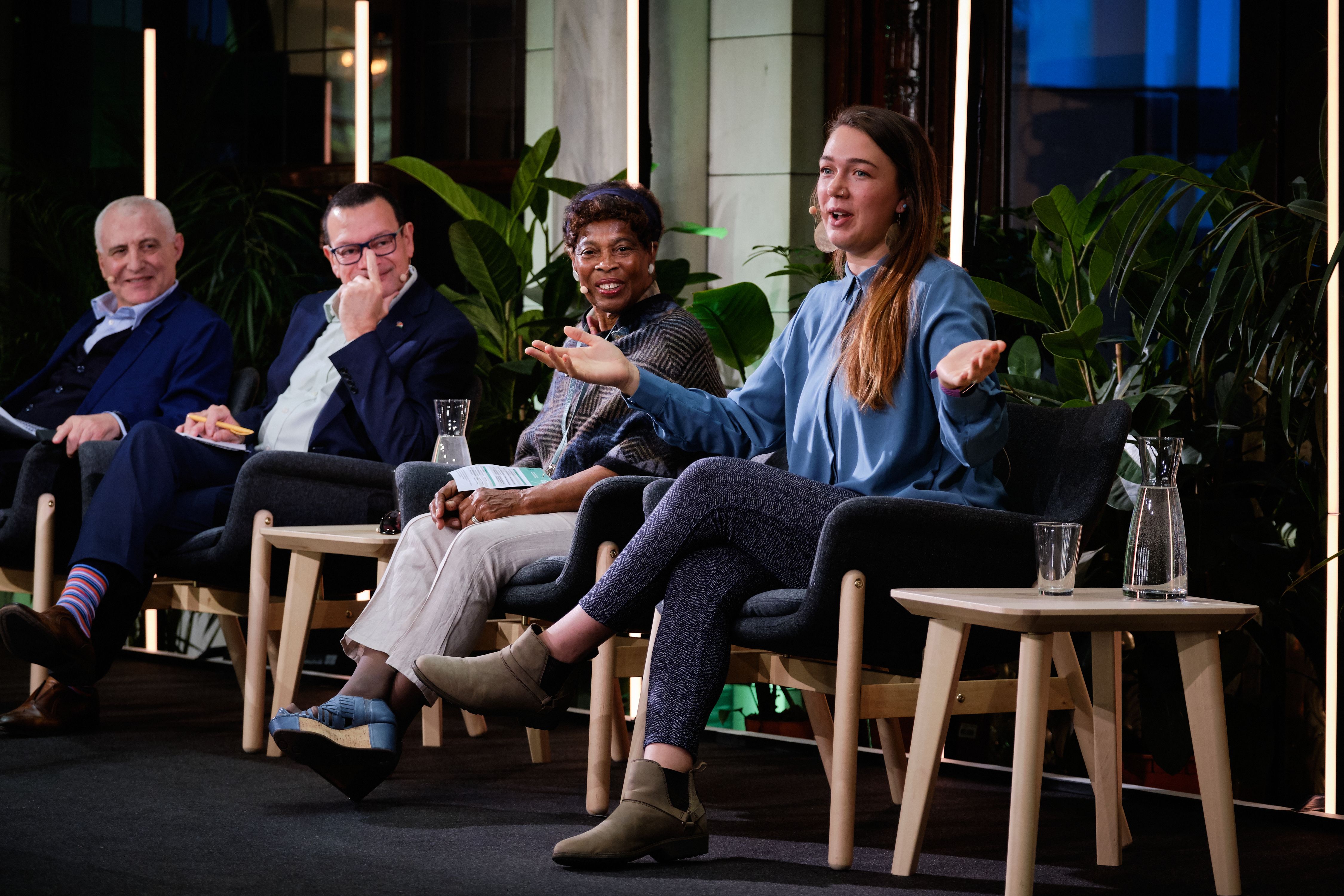 from the conference, speakers on stage