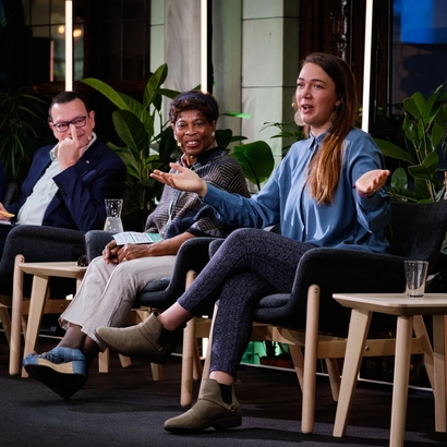 from the conference, speakers on stage