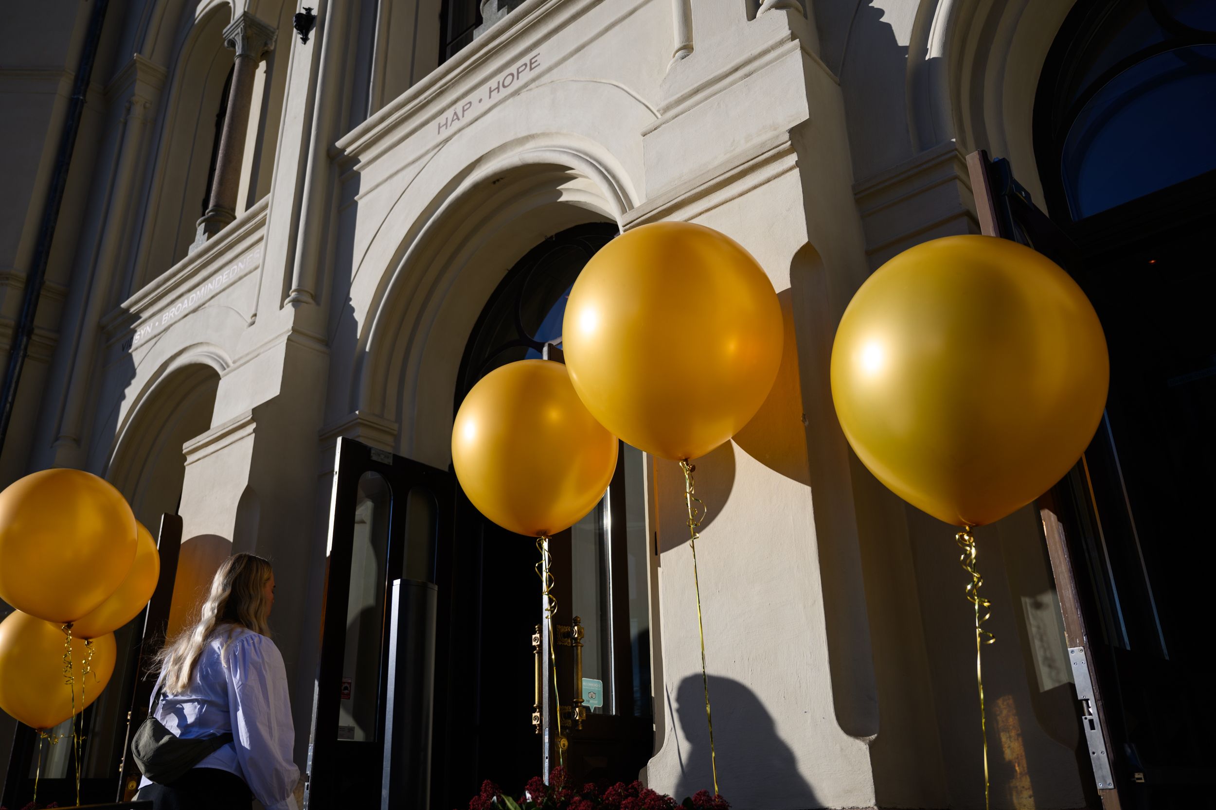 Gold colored baloons outside the nobel peace center.