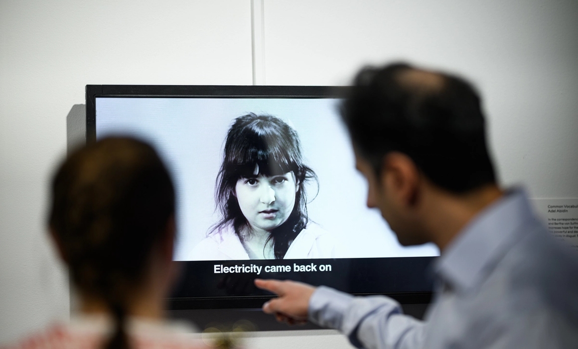 screen showing a girl in black and white, from the exhibition