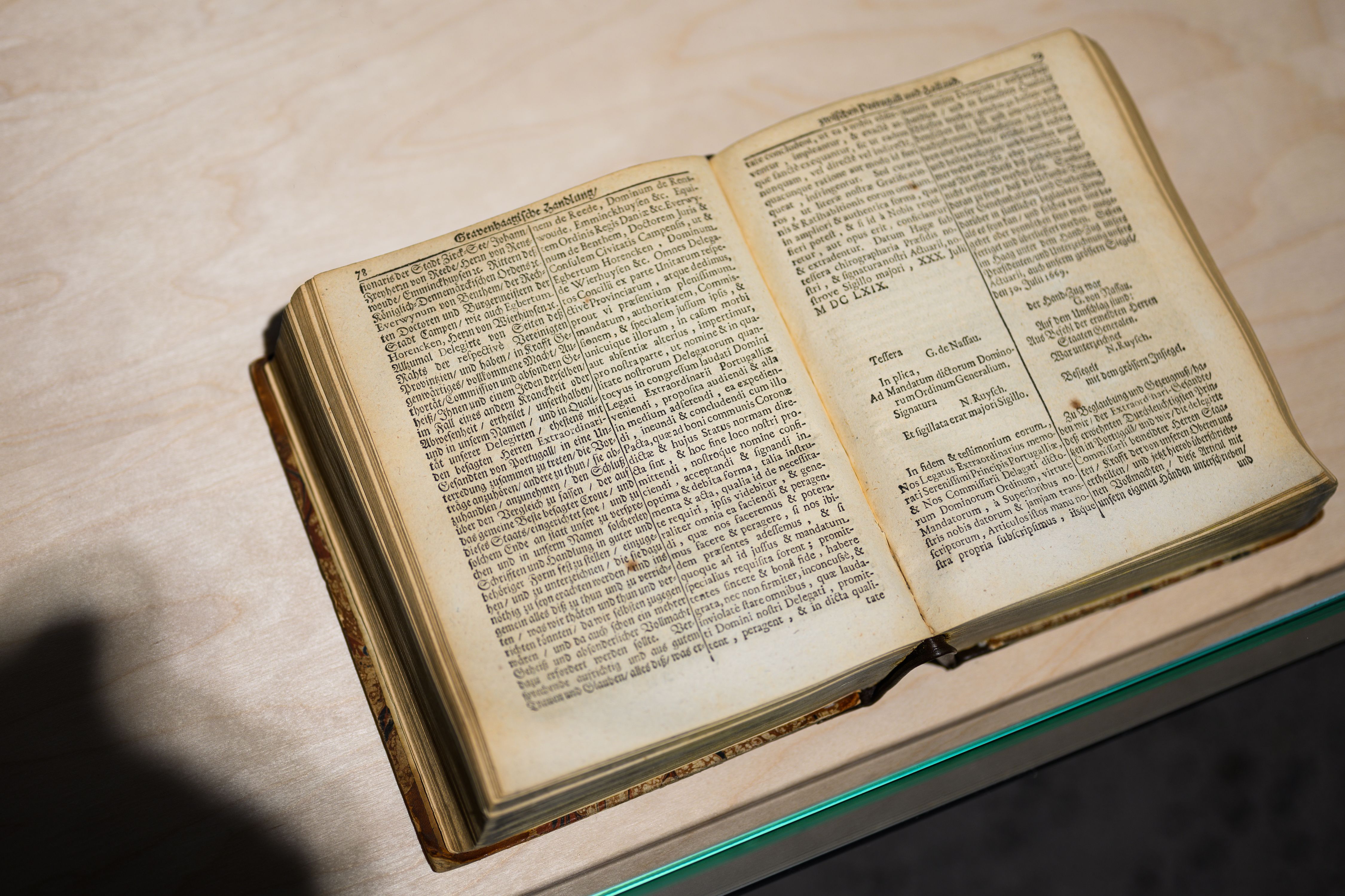 Historical book open to display peace treaty.