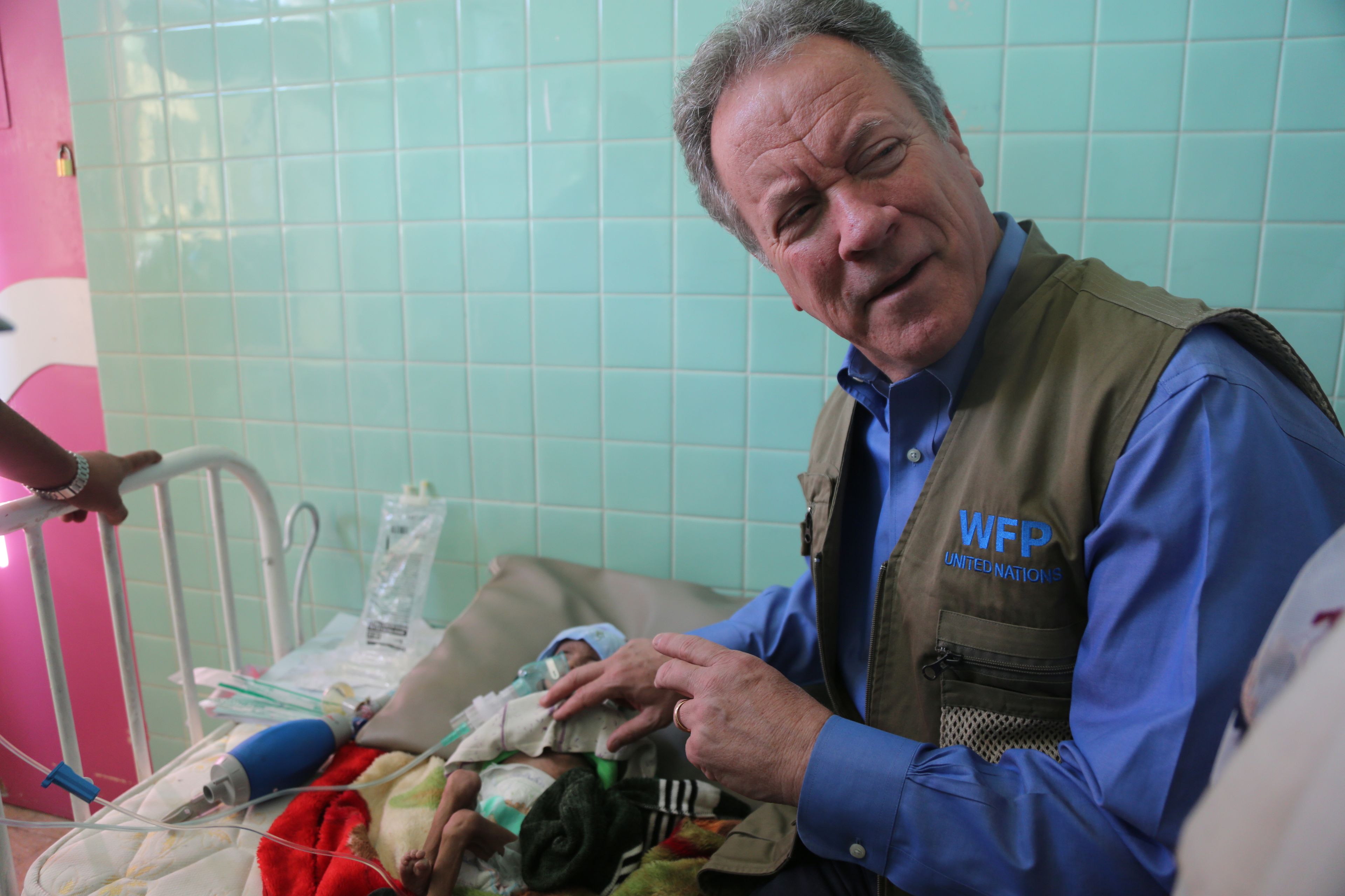 World Food Program. Premature baby and David Beasley, Executive Director of the United Nations World Food Programme