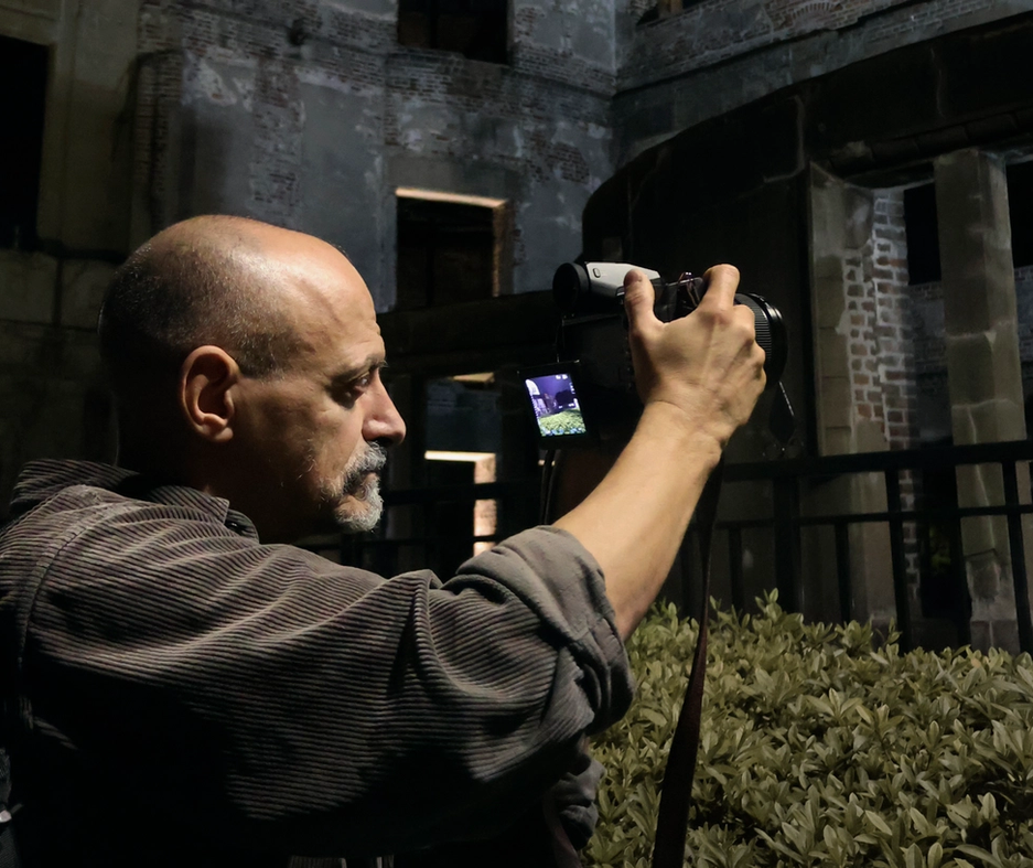 Antonio d'agata taking photos of ruins after hiroshima bombing.