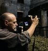 Antonio d'agata taking photos of ruins after hiroshima bombing.