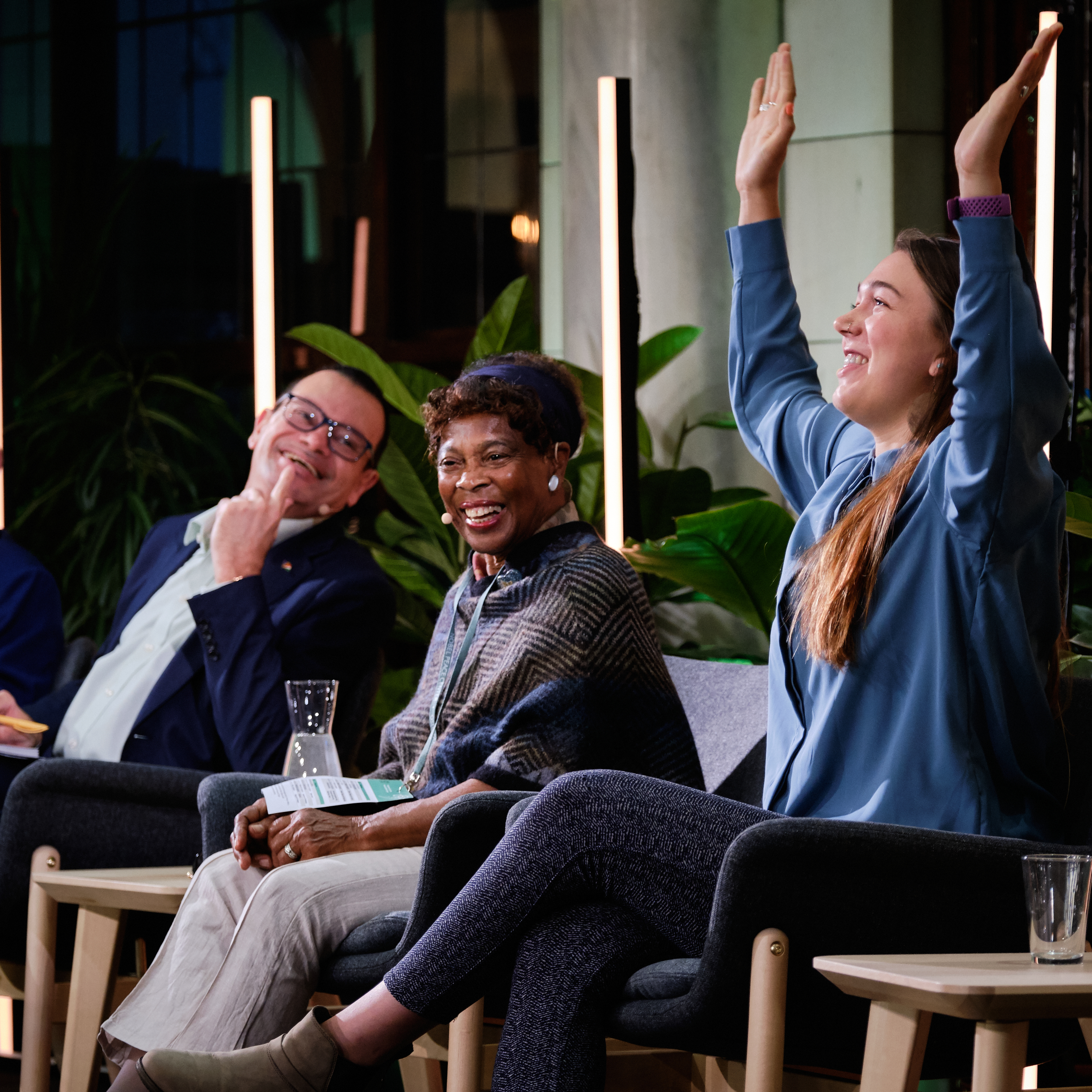 people on stage. cheering.