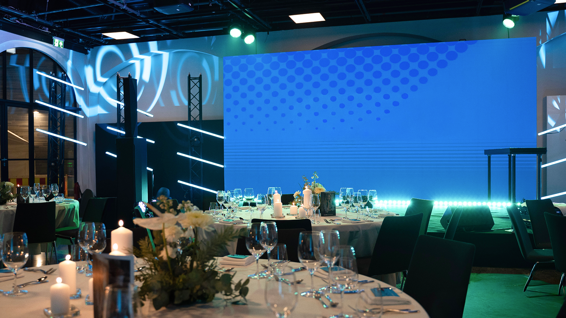 Arranged train hall with lights and table settings