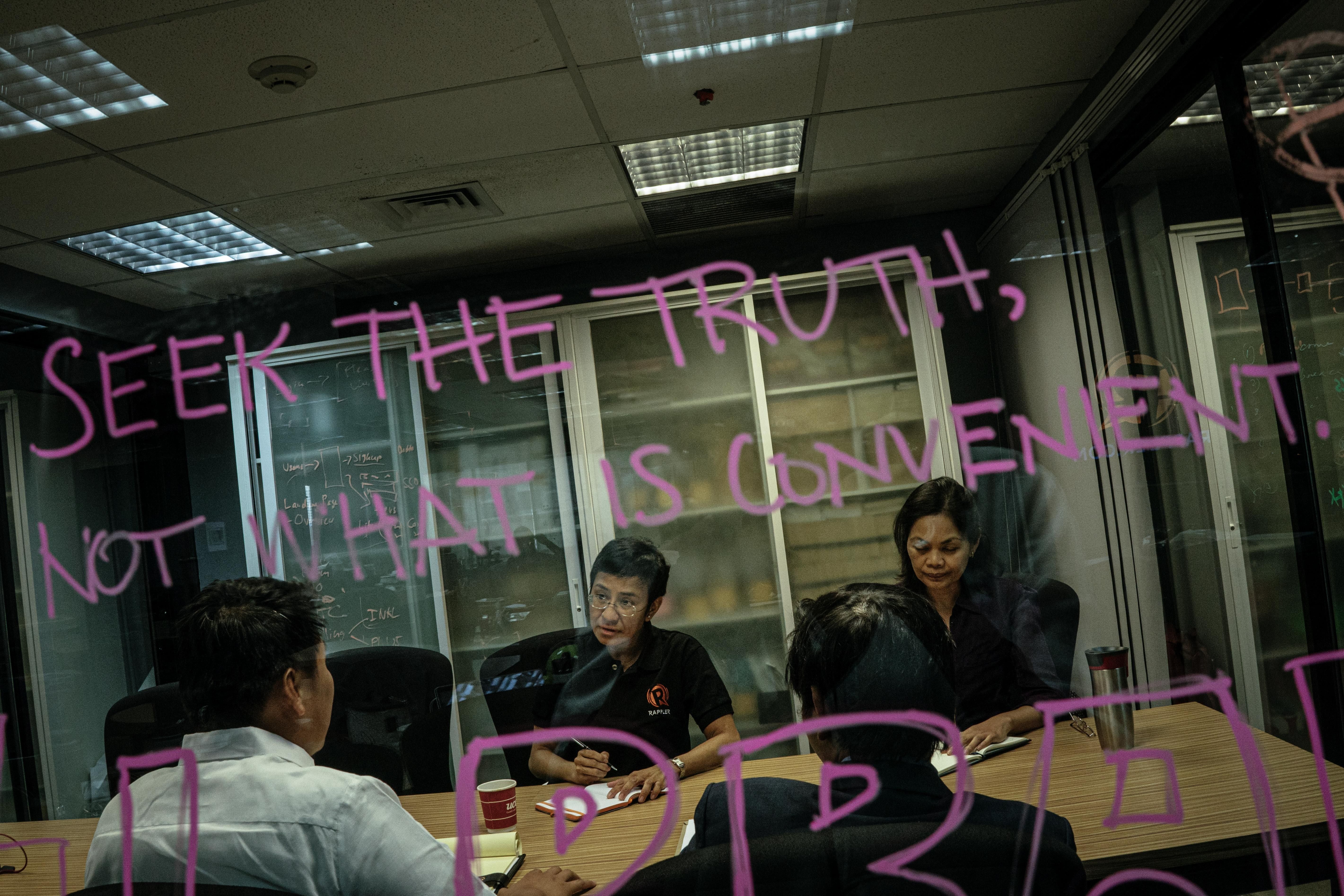 Seek the truth, not what is convenient! Maria ressa in the background of this writing.