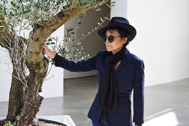   Yoko Ono with Wish Tree installation at Guggenheim, Bilbao, Spain. March 2014.