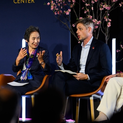 Conference speakers on stage