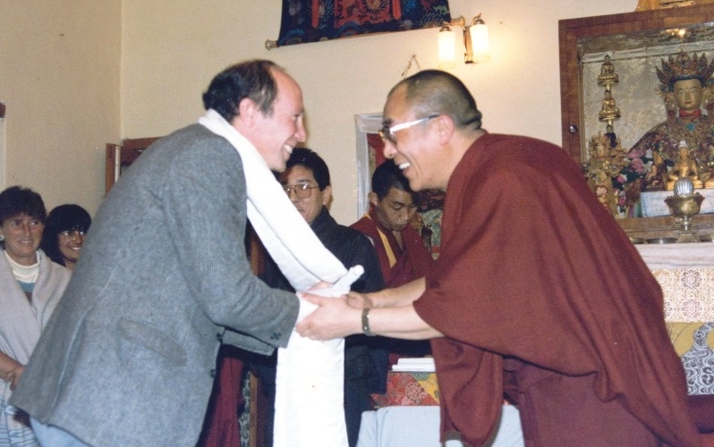 Dalai lama greeting man