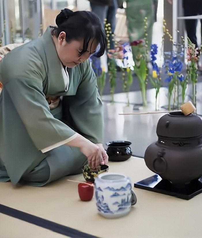 japanese tea ceremony - woman pouring tea