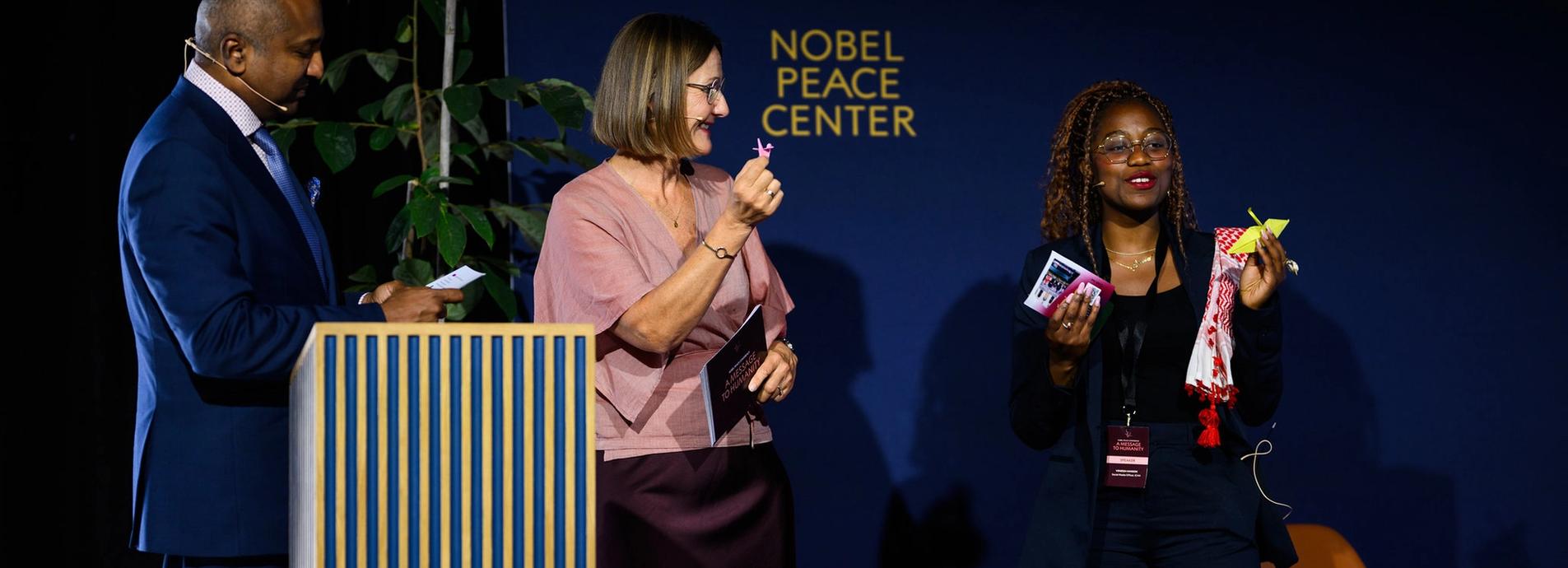 Sree Sreenivasan, Ingvill Bryn Rambøl and Venessa Hanson on stage.