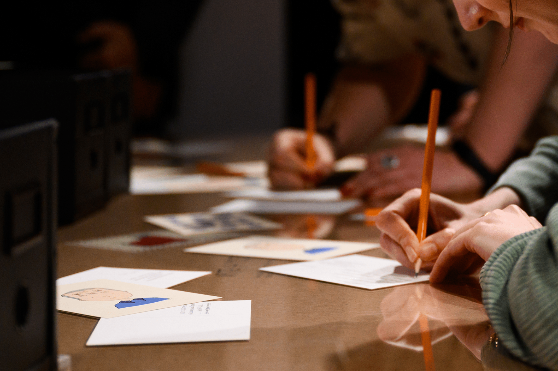 people writing letters