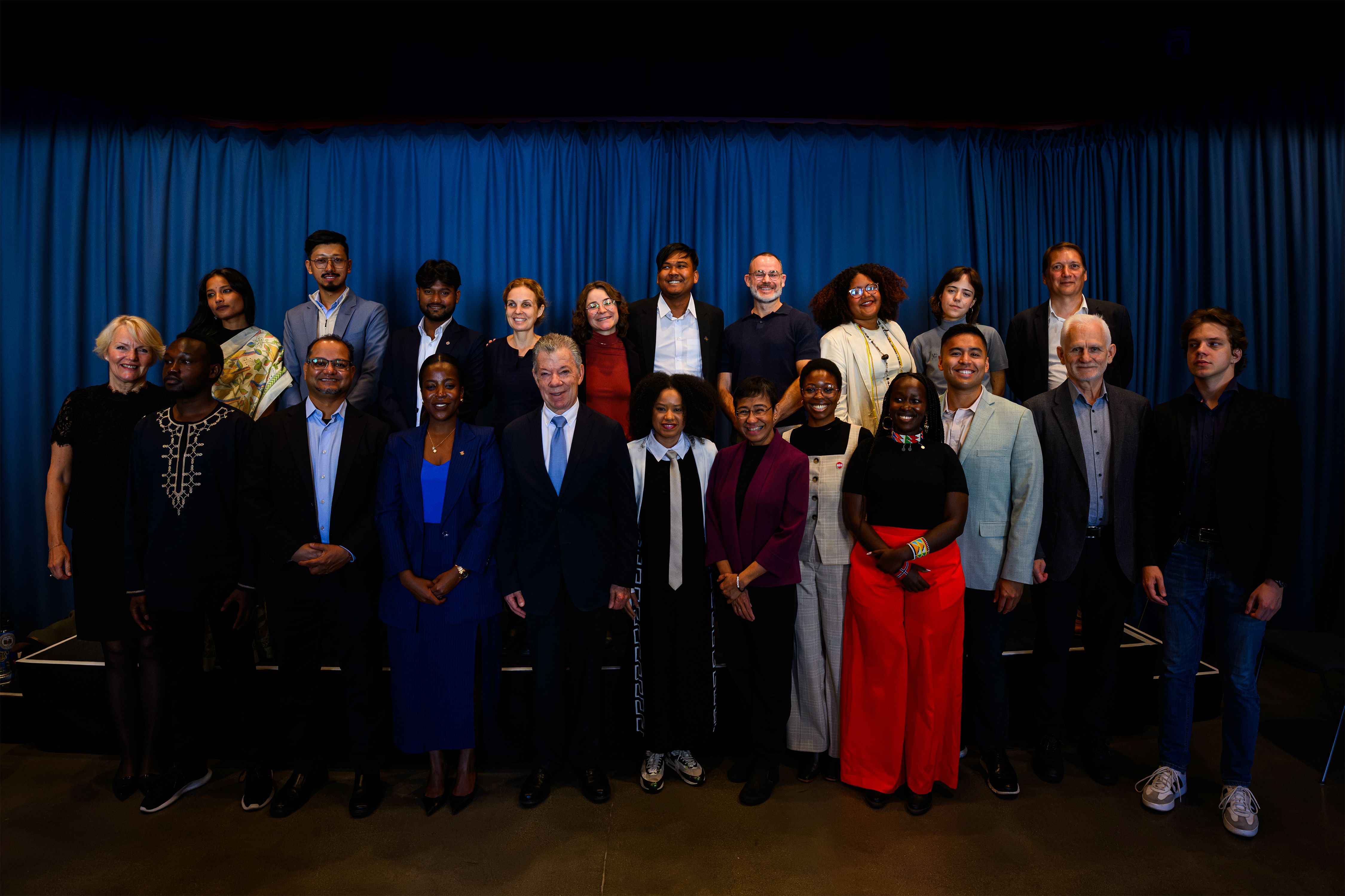 group photo of participants at the round table
