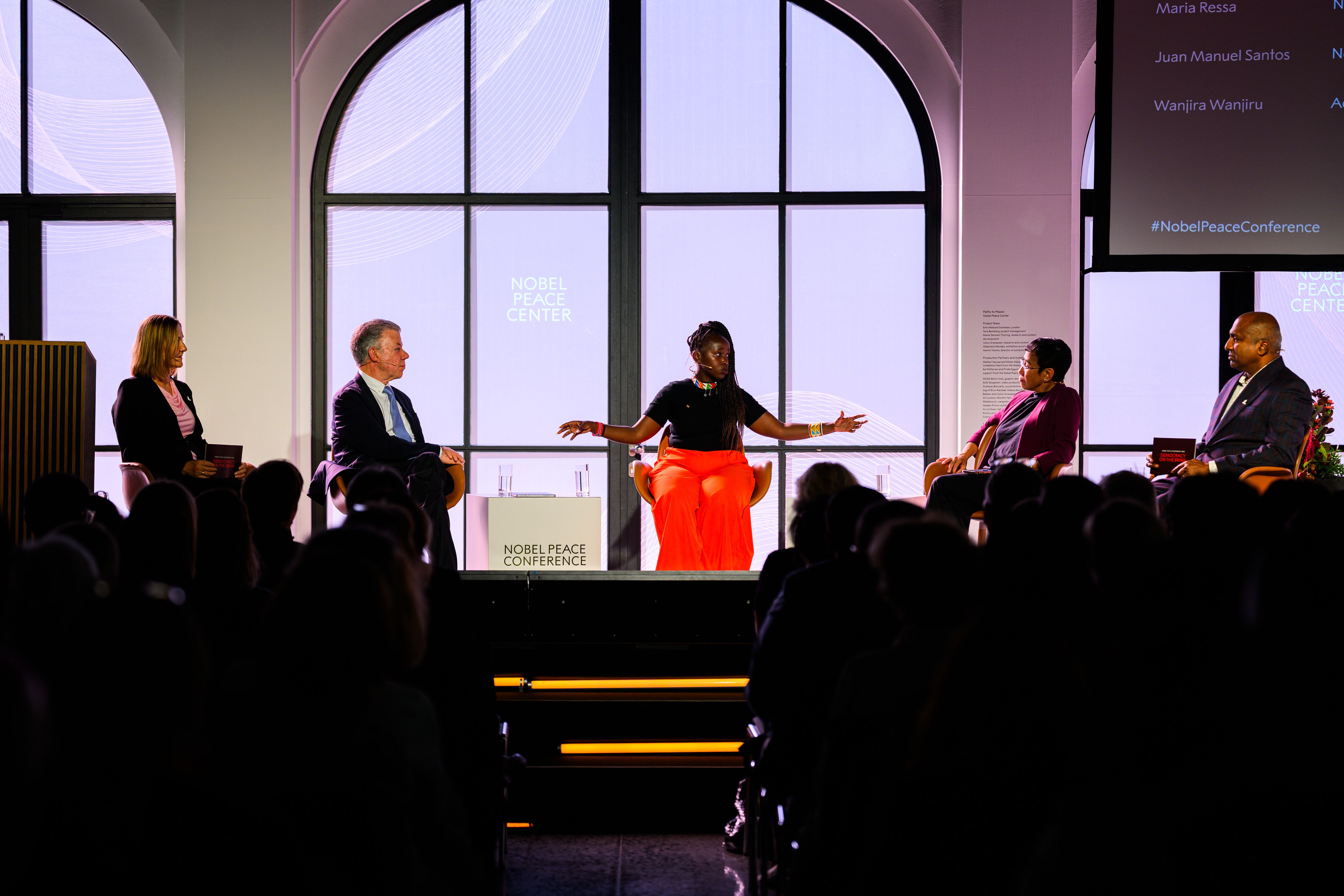 From the conference, juan manual santos, wanjira wanjiru and maria ressa on stage among others.