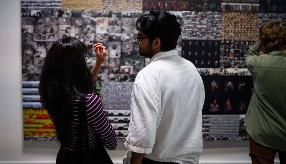 people in the exhibition war is peace.