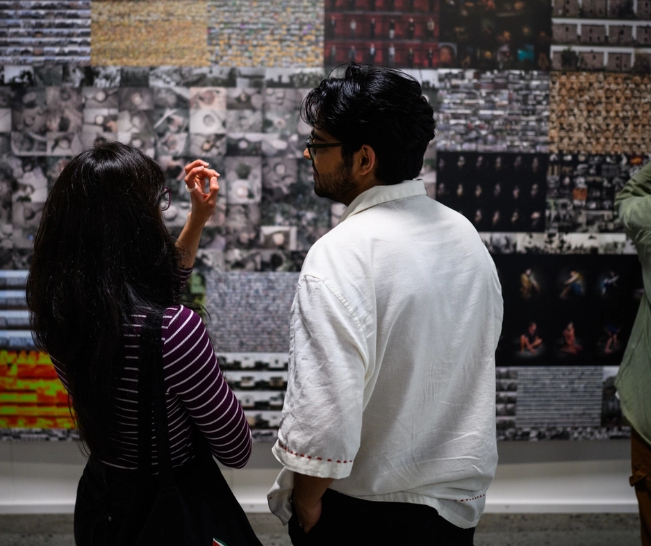 people in the exhibition war is peace.