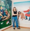 Lena Trydal står foran kontroversiell kunst hun har malt.