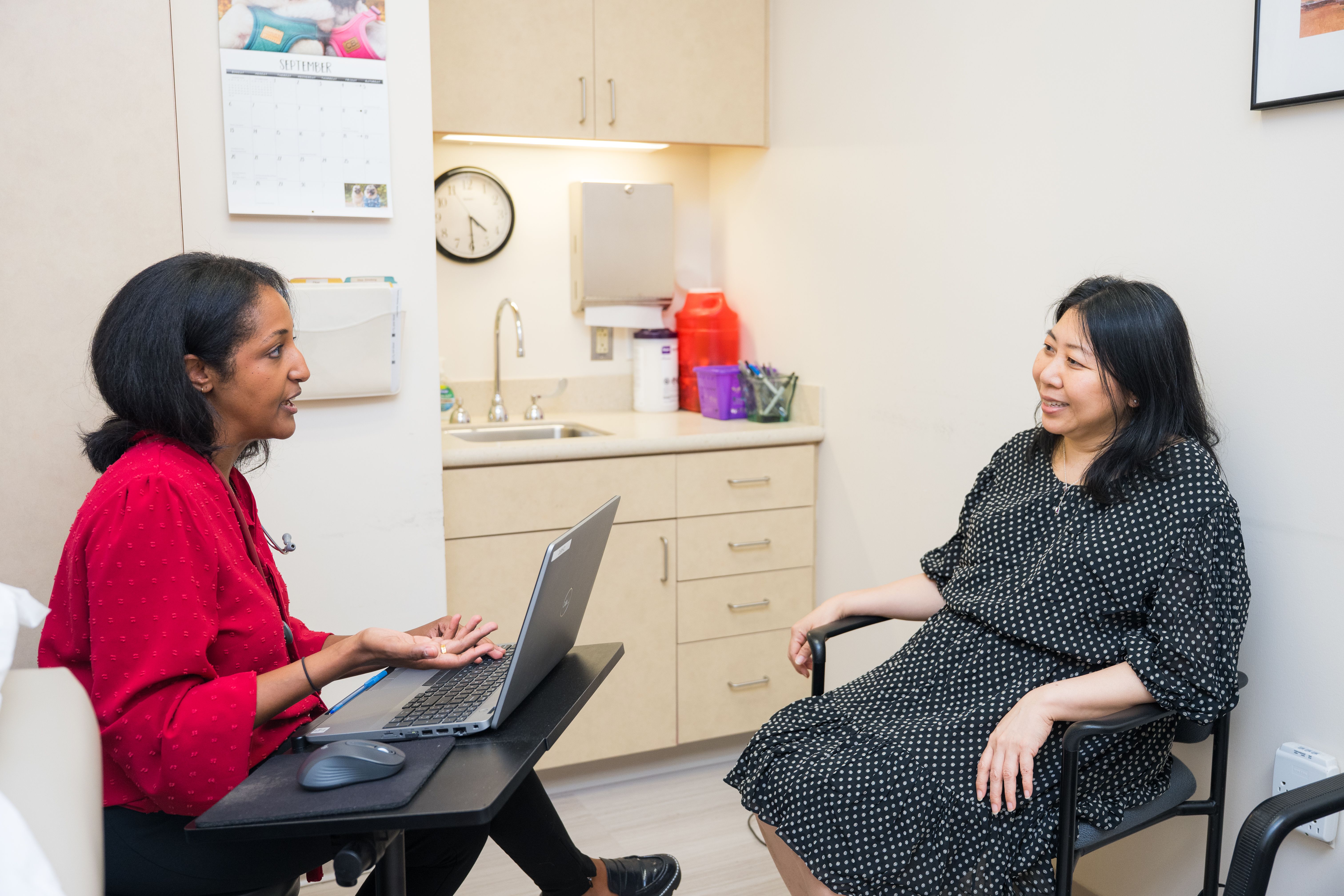 Doctor G speaking with a patient