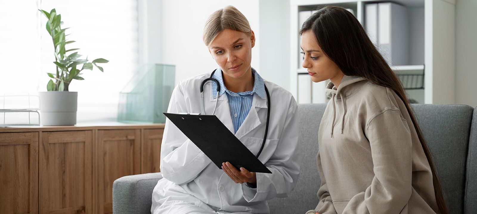 Doctor providing personalized healthcare guidance to a patient during a calm, focused consultation.