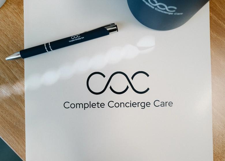 A pen and paper on a desk