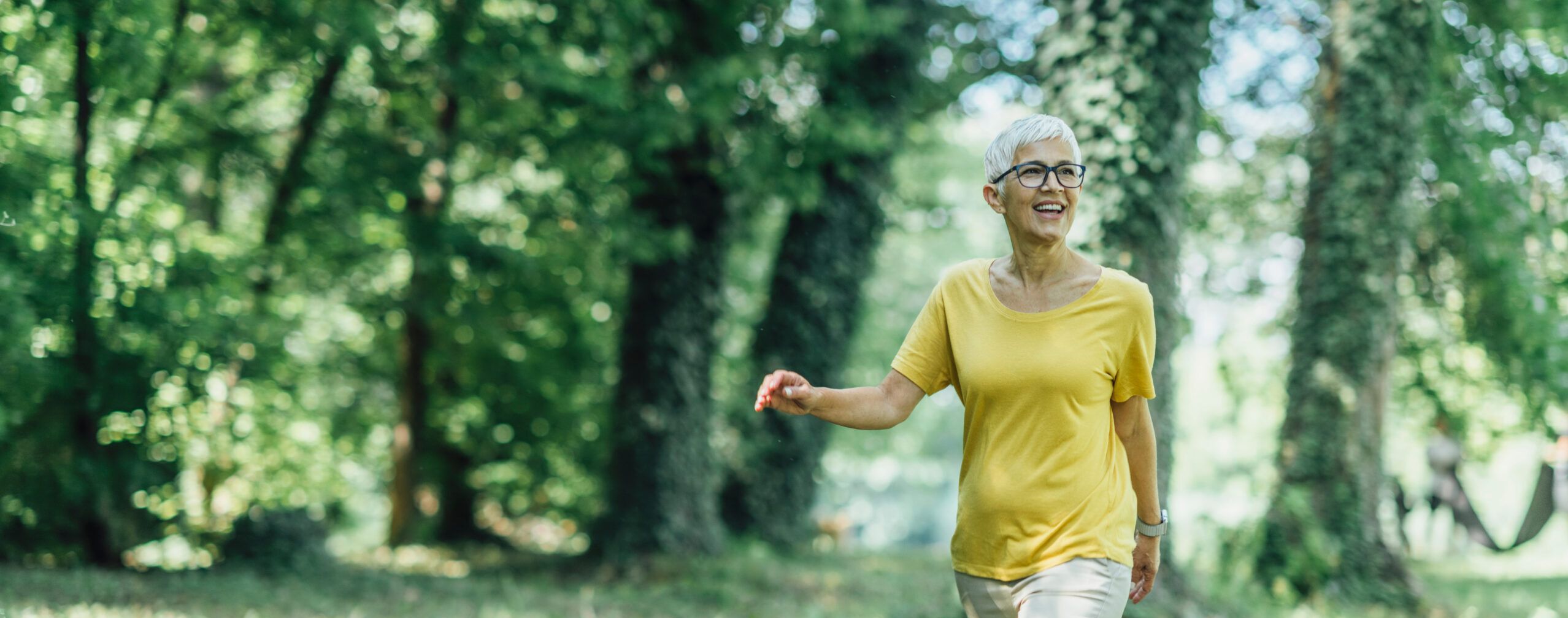 woman over 40 walking outside for health
