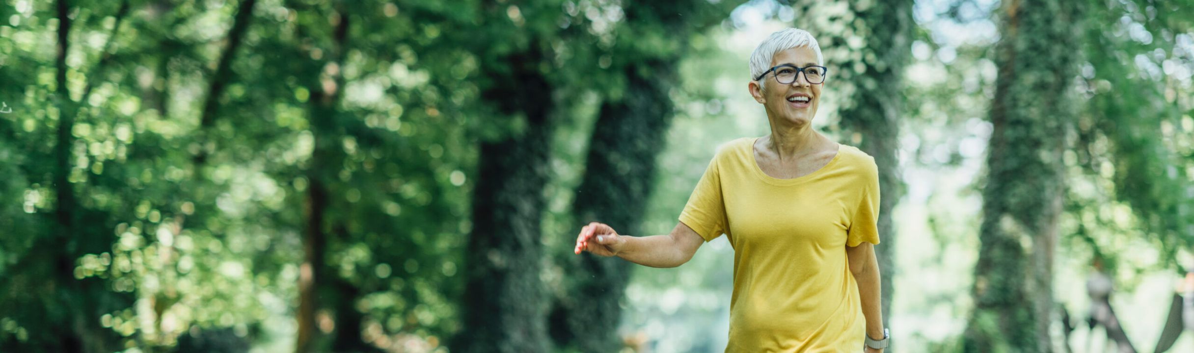 woman over 40 walking outside for health