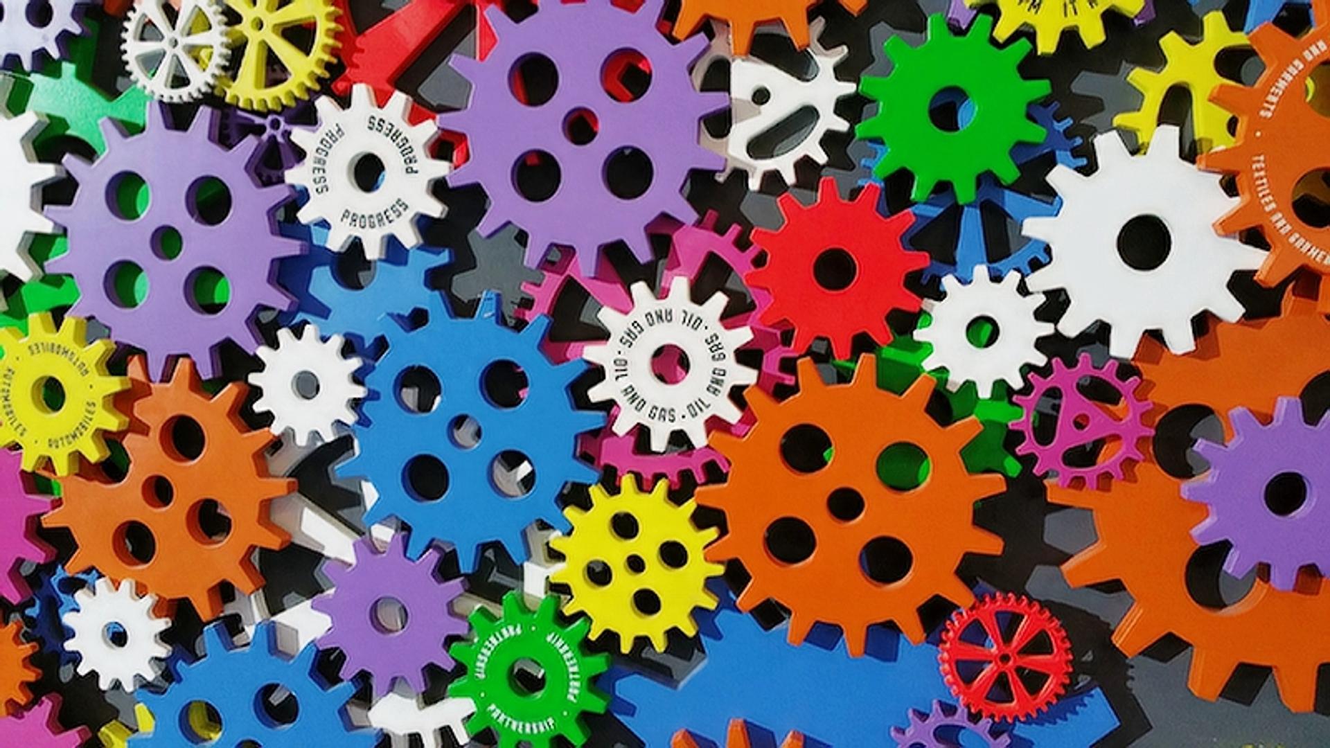 A bunch of gears connected together with different functions