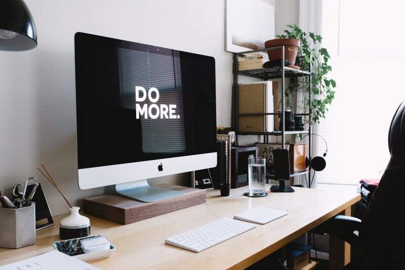 iMac on top of organized desk