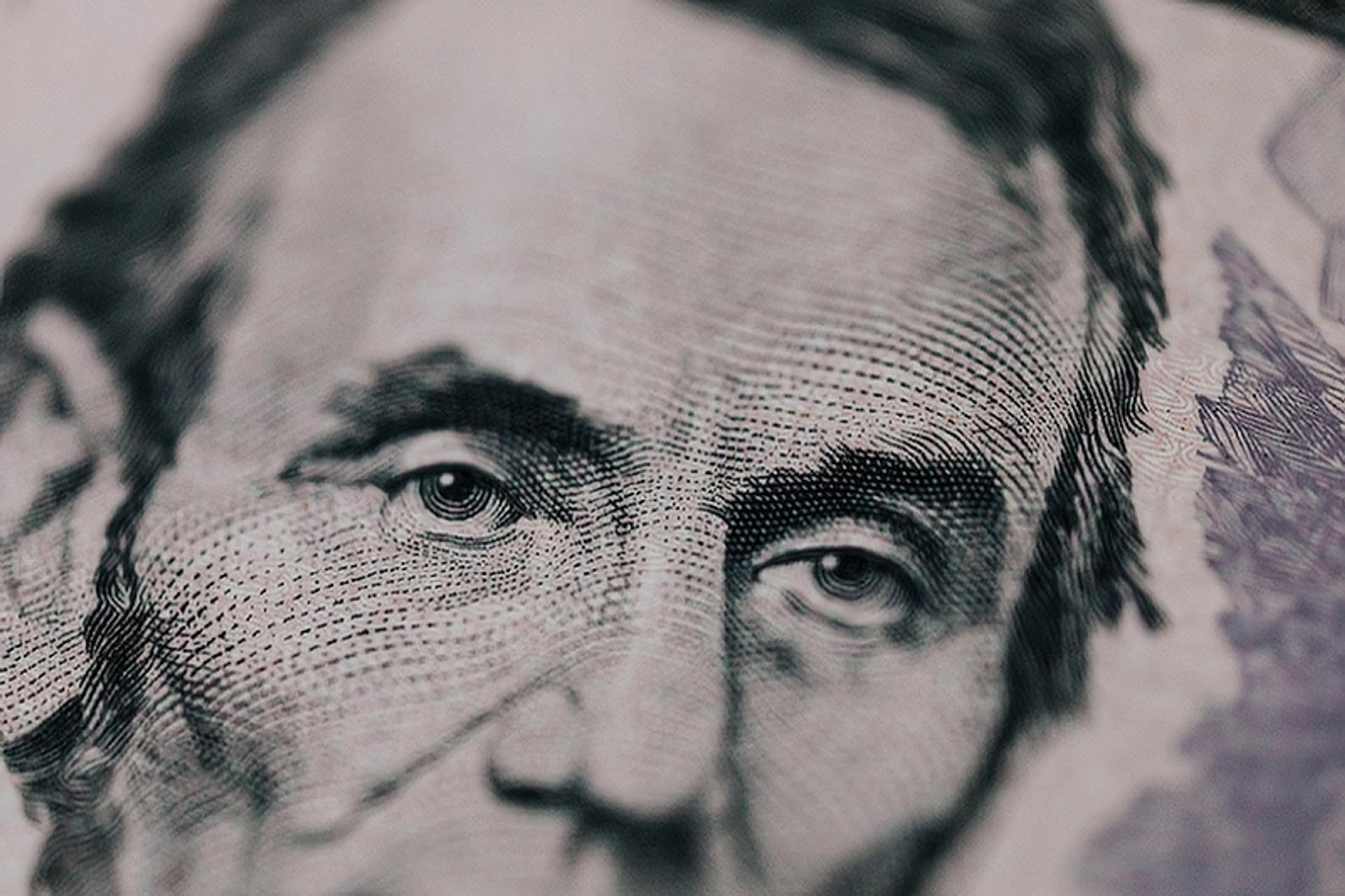 Closeup of Abraham Lincoln on the $5 bill