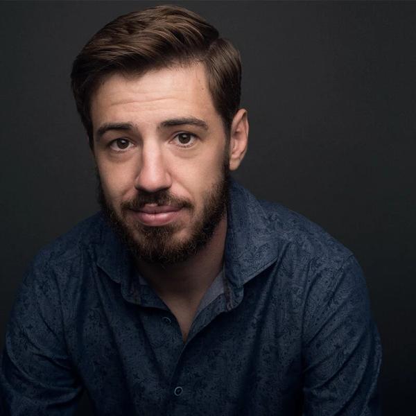 Headshot of AJ Holmes