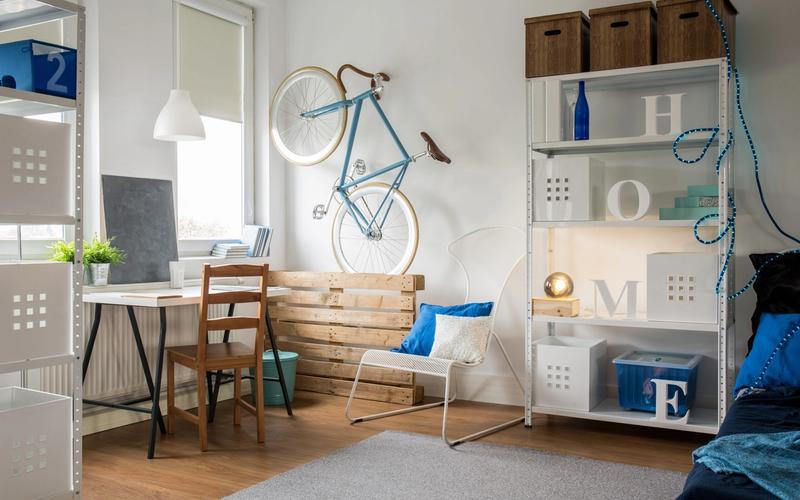 Stylish studio apartment with smart storage solutions and multipurpose furniture