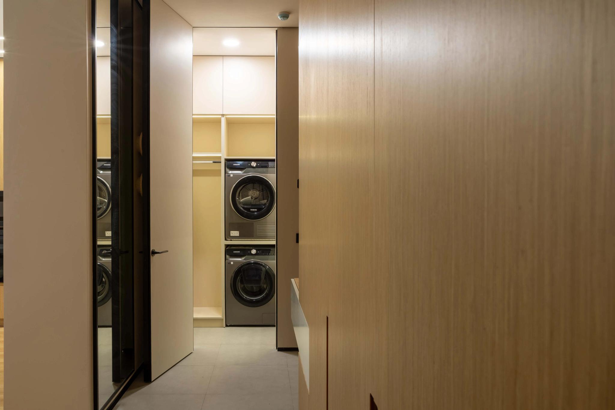 Contemporary laundry room with stacked washing machines, interior photography Kazakhstan by professional photographer