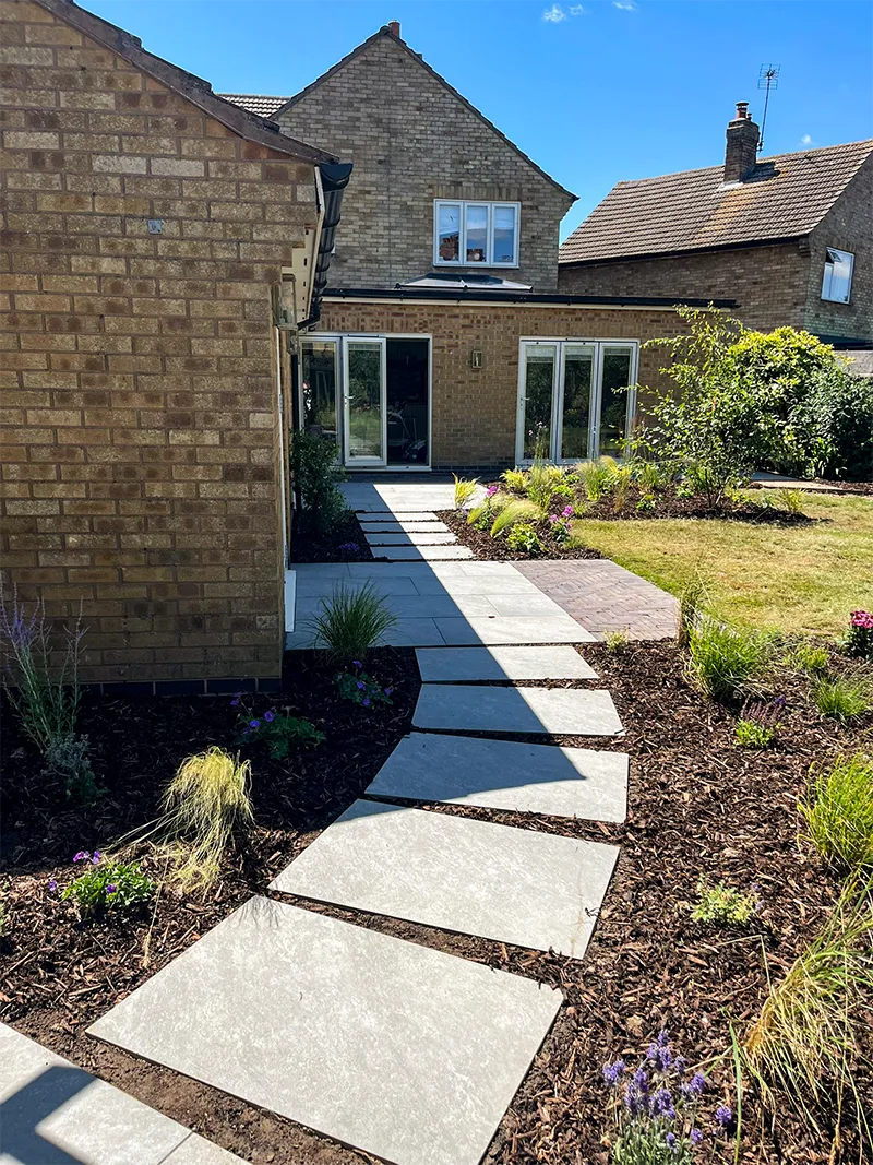 Pathway surrounded by planter boundaries 