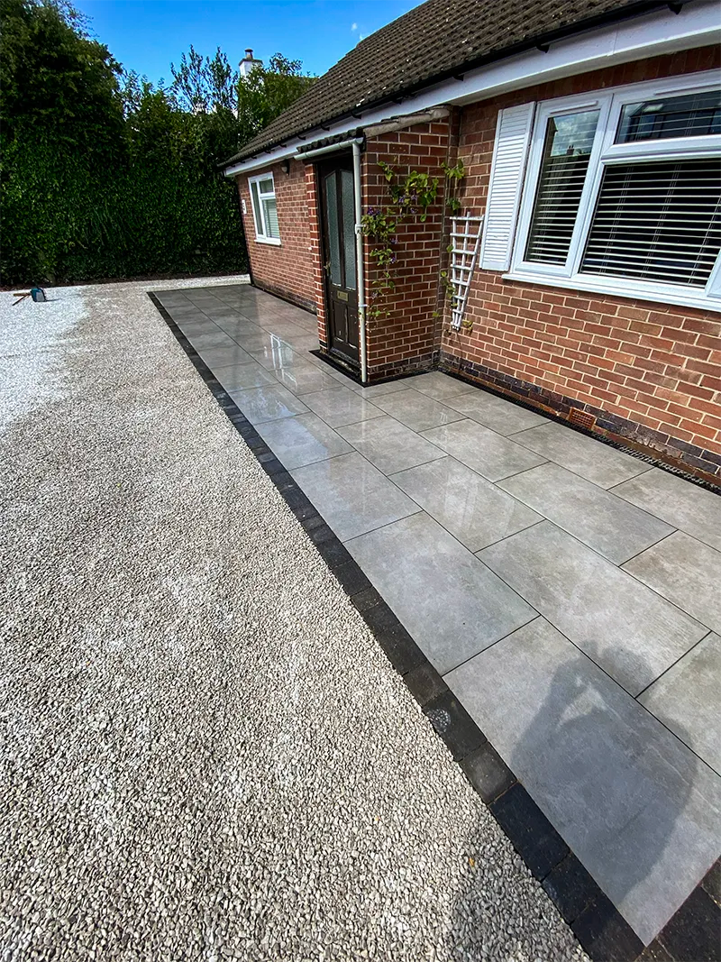 Newly completed porcelain patio and resurfaced driveway