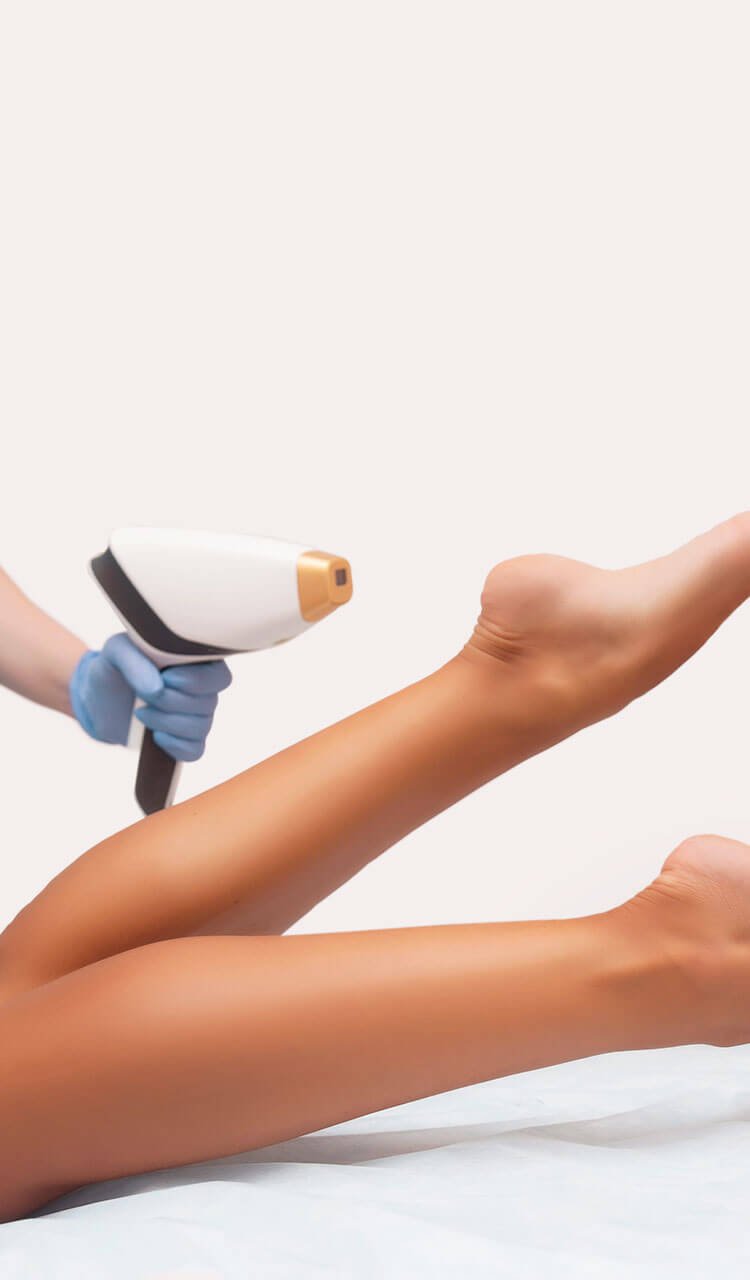 Laser therapy being done on legs