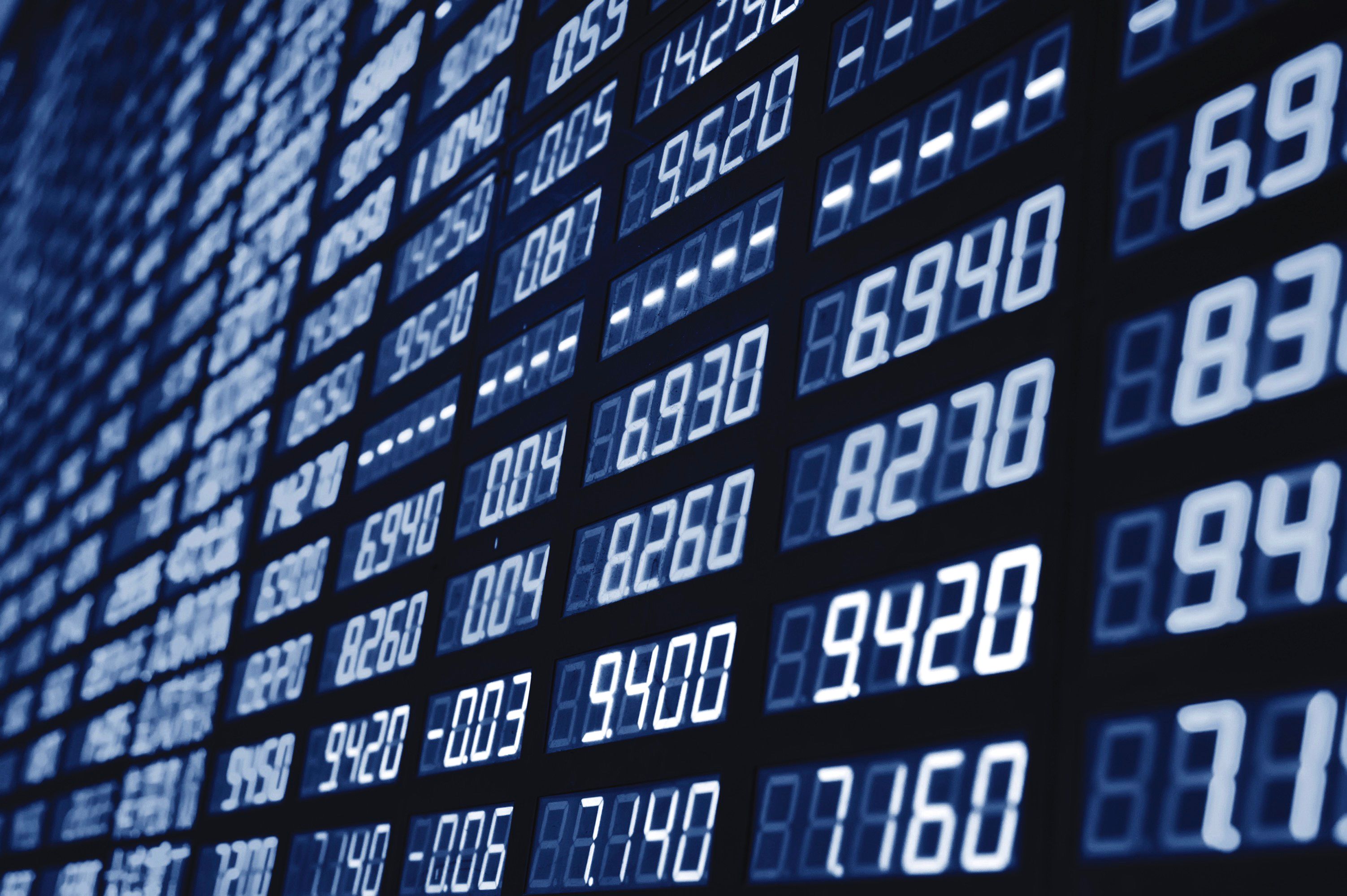 A digital screen showing stock market data