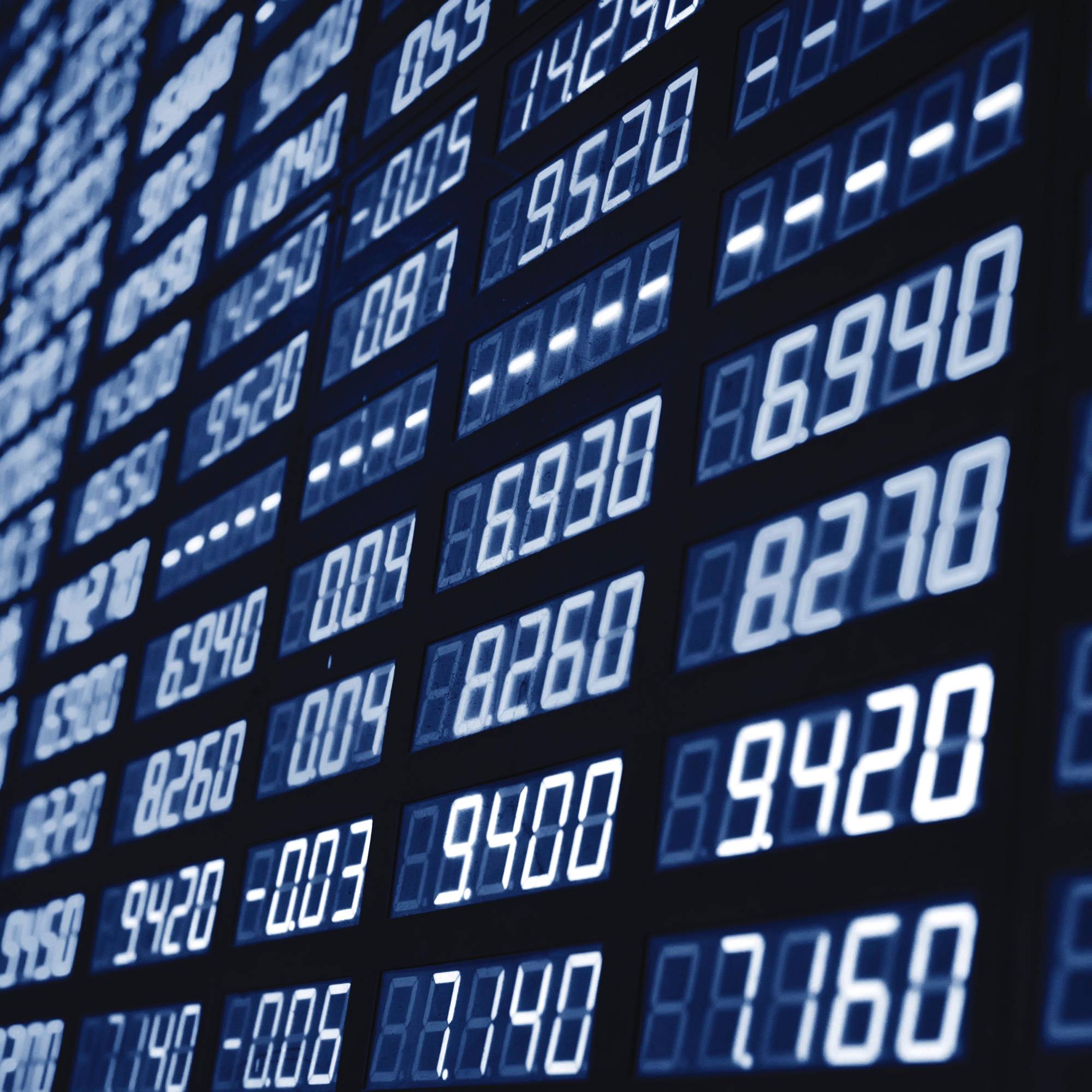 A digital screen showing stock market data