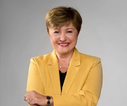A photo of Kristalina Georgieva smiling wearing a yellow blazer