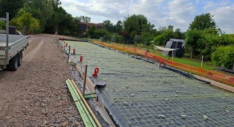 Glass-fibre reinforcement mesh installed for a garage-box concrete floor