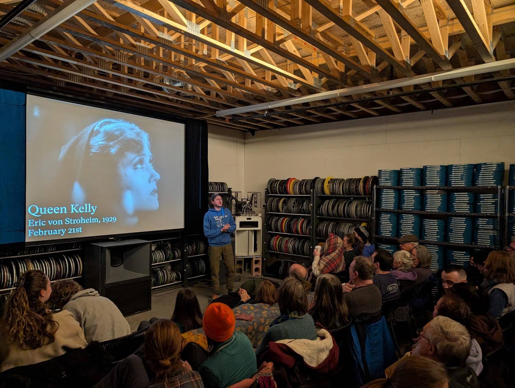 Skylar Kelly introducing a film at Kinonik microcinema