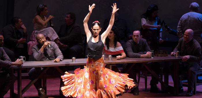 A dancer performs on stage at Opera Maine