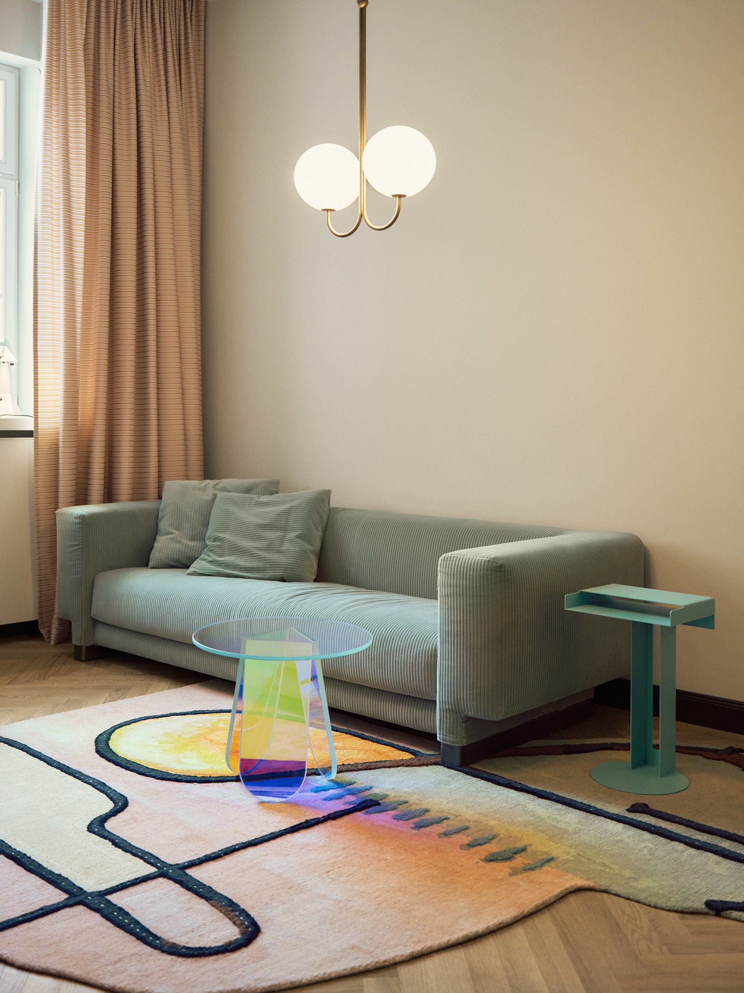 Der Loungebereich des Stephanie Thatenhorst Interior Design Offices verbindet textile Ruhe, grafische Teppiche und ausgewählte Designobjekte zu einer atmosphärisch ausgewogenen Arbeitsumgebung.