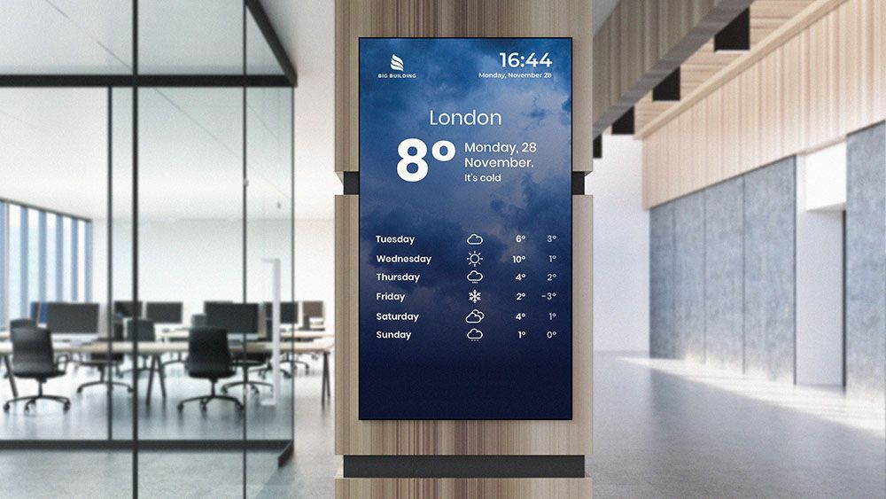 Modern digital signage display showing vibrant content in a corporate environment