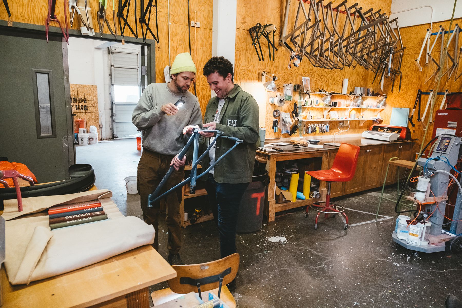 A book open on the workbench.