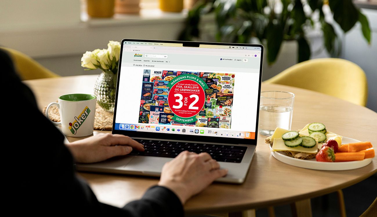 Person ser på Joker sin nye nettside på en bærbar PC